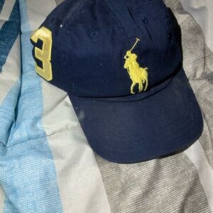 Navy Blue Polo Cap with Yellow Logo